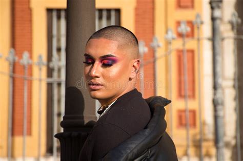 Non-binary Person, of South American Origin and Young, the Person is a Make-up Artist and Poses ...