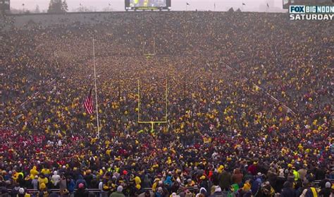 Video: Michigan fans storm the field after beating Ohio State