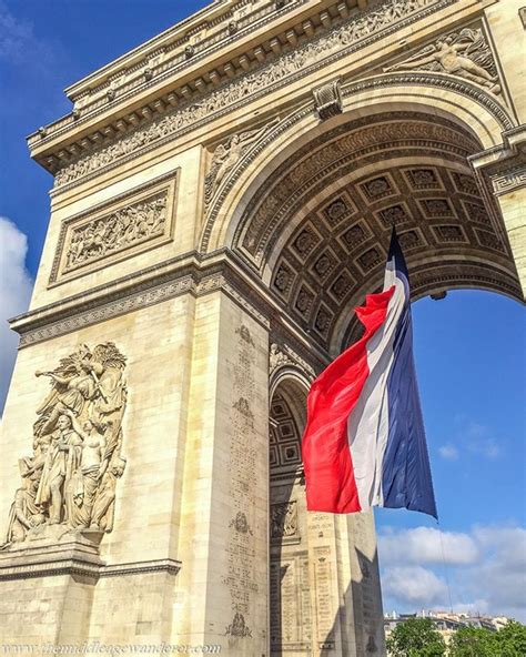 The French flag flying at the Arc de Triomphe Paris. Paris is such a ...