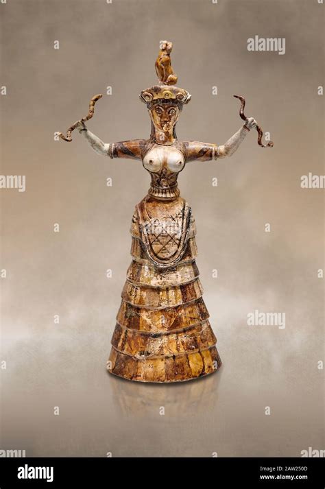 Minoan Snake Goddess statue arms raised holding 2 snakes from the Knossos-Temple Repositories ...