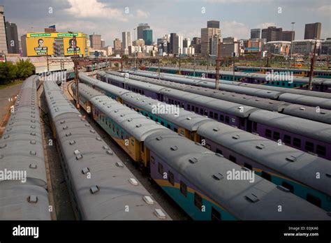 trains and tracks of the central Park Station and the skyline of ...