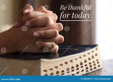 Inspirational Quote - Be Thankful for Today. with Background of Young Woman Clenched Prayer ...