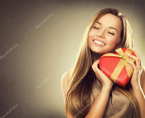 Happy girl with Valentine gift box — Stock Photo © Subbotina #74132411