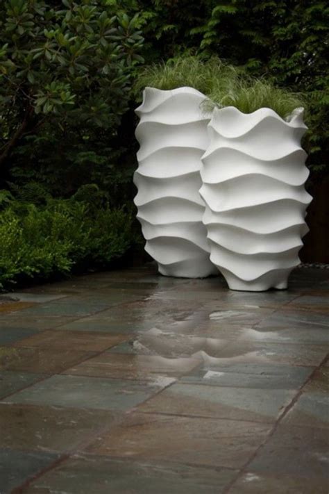 37 Modern Planters To Make Your Outdoors Stylish - DigsDigs