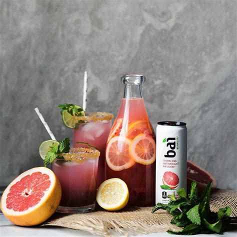 Grapefruit, Orange, and Limeade Cocktails with Mint Garnishes