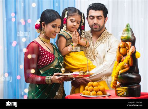 Maharashtrian family praying Lord Ganesha at Ganesh Chaturthi Stock ...