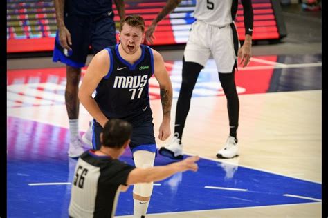 Luka Doncic's triple-double propels Mavs past Spurs