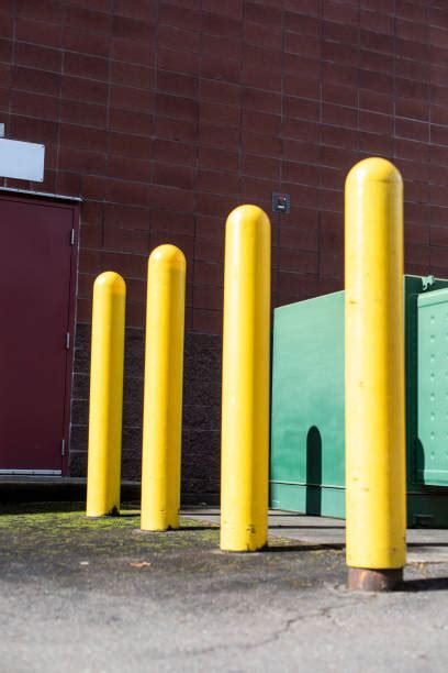 Parking Lot Bollards Stock Photos, Pictures & Royalty-Free Images - iStock