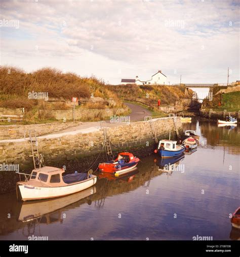 Seaton Sluice Harbour and boats Stock Photo - Alamy