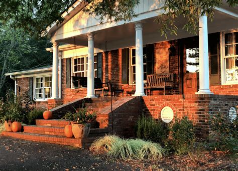 best colors to go with a red brick house in Atlanta - porch - Laurel Home