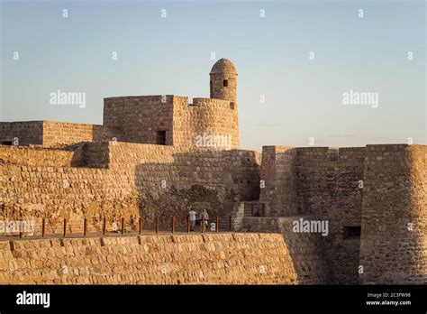 Manama / Bahrain - January 10, 2020: tourists visiting Qal'at al-Bahrain castle in Manama ...