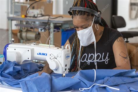 Making medical gowns during Covid-19 outbreak - Stock Image - C048/9244 - Science Photo Library