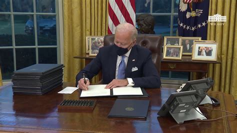 Biden signs mask mandate as first executive order, says Trump left ...