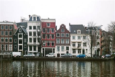 "Traditional Dutch Houses On Canal In Amsterdam, Netherlands." by ...