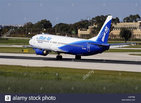 Blue Air Boeing 737-400 on takeoff Stock Photo - Alamy