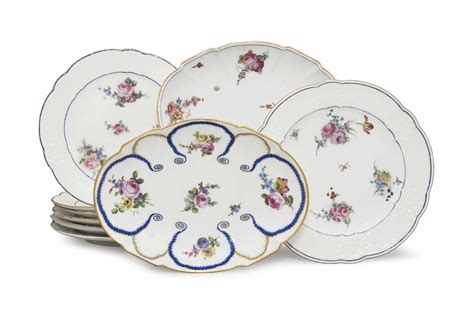 SEVEN SEVRES PORCELAIN PLATES AND TWO SEVRES PORCELAIN OVAL DISHES (COMPOTIER OVAL) , CIRCA 1768 ...