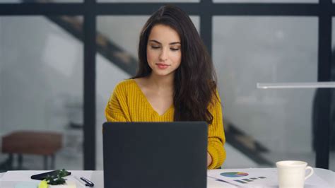 Professional Woman Finishing Work On Laptop Stock Footage SBV-338351557 - Storyblocks