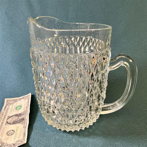 FACETED GLASS LEMONADE PITCHER | EstateSales.org