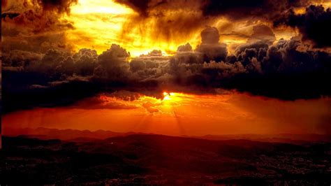 Sunset Through Dark Clouds Wallpaper Nature Wallpaper - vrogue.co