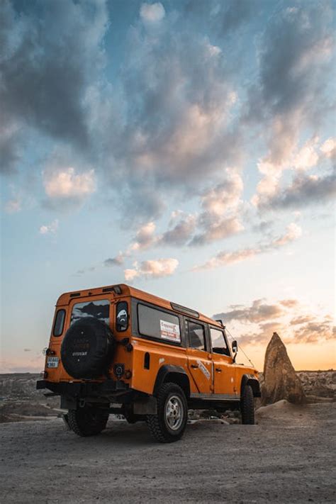 Photo of 4x4 Vehicle Parked on Dirt Road · Free Stock Photo