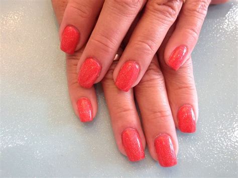 Acrylic nails with coral polish and glitter | Acrylic nails … | Flickr