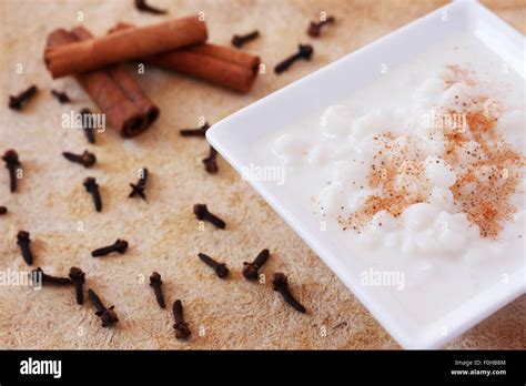 Brazilian dessert canjica of white corn with cinnamon and clove in ...