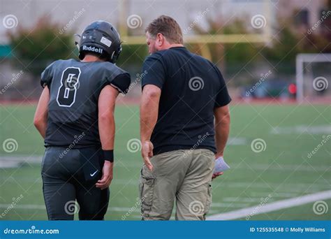 High school football coach editorial stock photo. Image of kids - 125535548