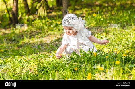 Cute smiling baby girl outdoors Stock Photo - Alamy