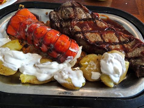 Norm's site: Lobster with butter and cream sauce, strip steak and salad