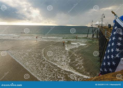 Pismo Beach Pier during ISA World Para Surfing Championship. Long Wooden Pier, Sandy Beach, and ...