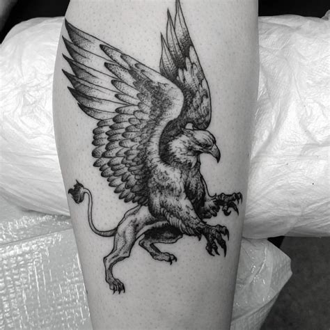 Traditional Griffin Tattoo - TATTOOGOTO