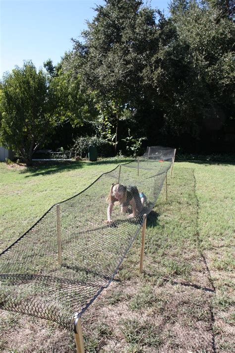 Obstacle course: cargo net crawl | Backyard obstacle course, Kids ...