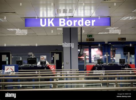 Passport control. HM UK Border Agency, Manchester Airport Stock Photo - Alamy