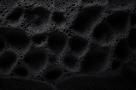 Premium AI Image | Black sponge like surface