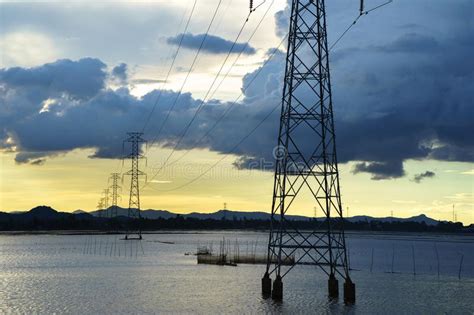 Sunset Lake Scene with Electric Poles and Wires in South of Vietnam ...