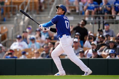 Watch: Shohei Ohtani slams a home run during his spring training debut with the Los Angeles ...