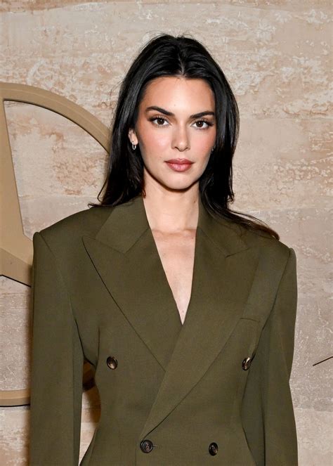 Kendall Jenner is sleek and chic in an olive green suit at starry Beverly Hills event ...