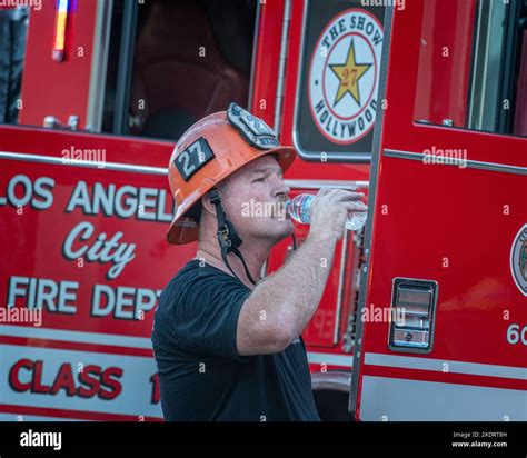 Los Angeles, CA, USA – November 3, 2022: Los Angeles Fire Department firefighters put out a ...