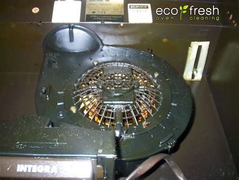 Extractor-hood-fan-motor-covered-in-cooking-oil - Eco Fresh Oven Cleaning