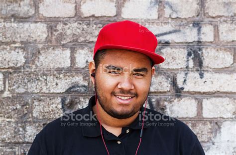 Young Black Man In Headphones Stock Photo - Download Image Now - Baseball Cap, Men, Red - iStock