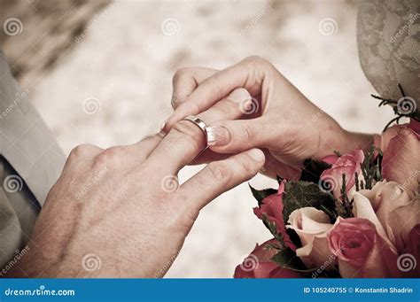 Ring on groom`s finger stock image. Image of fashion - 105240755