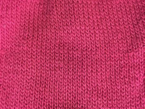 Close up of pink knitted cotton glove | Free Textures