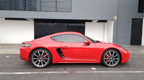 My first ever Porsche. 718 Cayman S guards red : r/Porsche