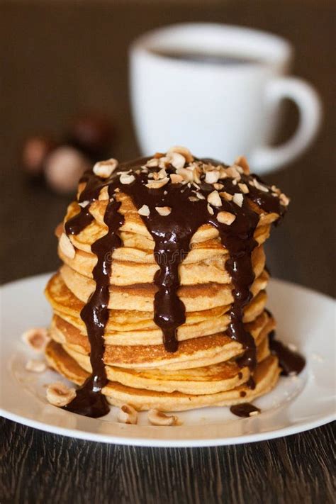 Pancakes With Chocolate Syrup Stock Photo - Image of filled, food: 14689172