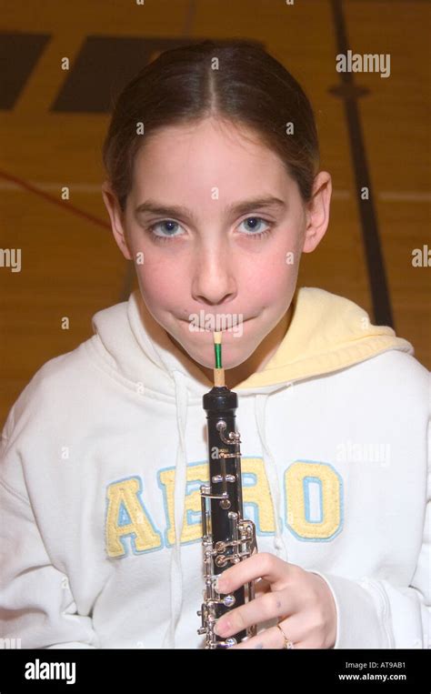 Portrait of Middle School Aged Student Playing a Musical Band Instrument Stock Photo - Alamy