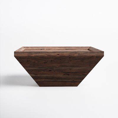 This handcrafted coffee table is the perfect anchor for living rooms of ...