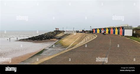 Colourful beach huts on the sea front in winter at Dawlish Warren ...