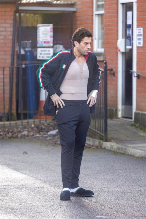 James Argent looks in agonising pain as he emerges from hospital in ...