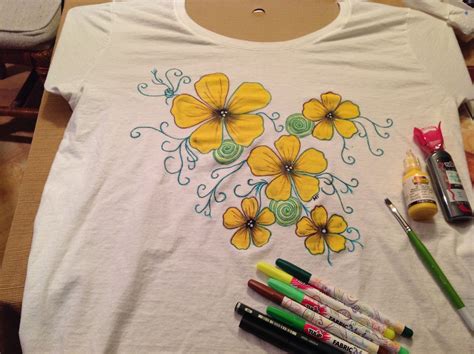 T-Shirt painting flowers. Using Scribbles 3d fabric paint and Tulip fabric markers. 3/8/14 ...