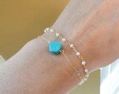 Items similar to Delicate Turquoise bracelet, Pearl bracelet with turquoise dot, Stacked ...